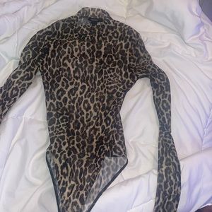 cheetah body suit , great condition , never worn , no scratches or tears.
